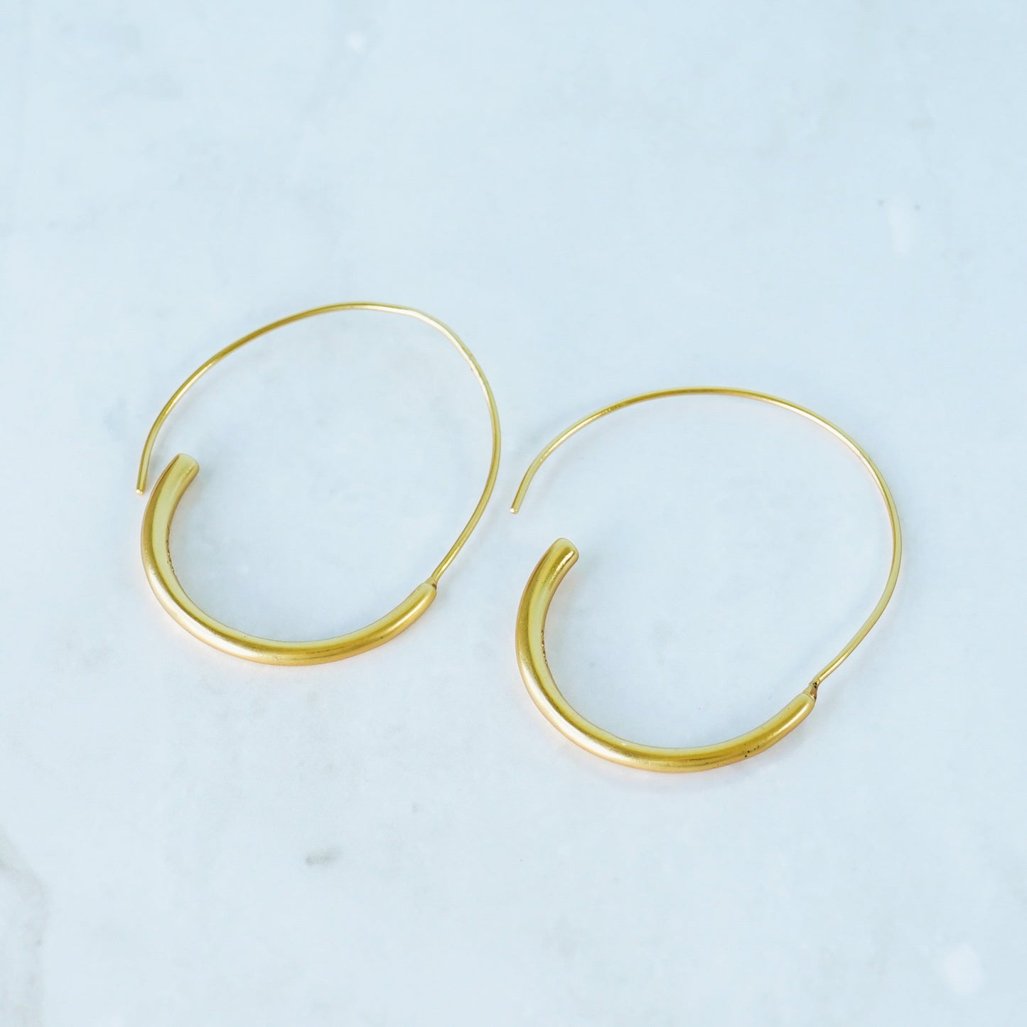 Large gold hoop earrings