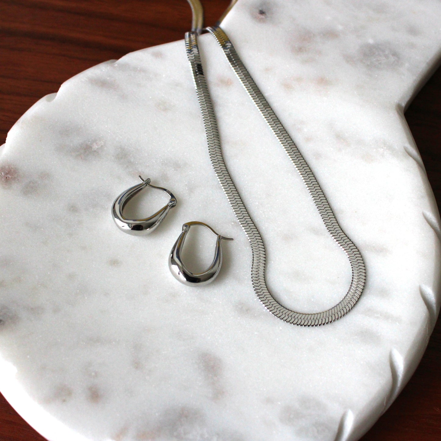 Teardrop silver hoop earrings