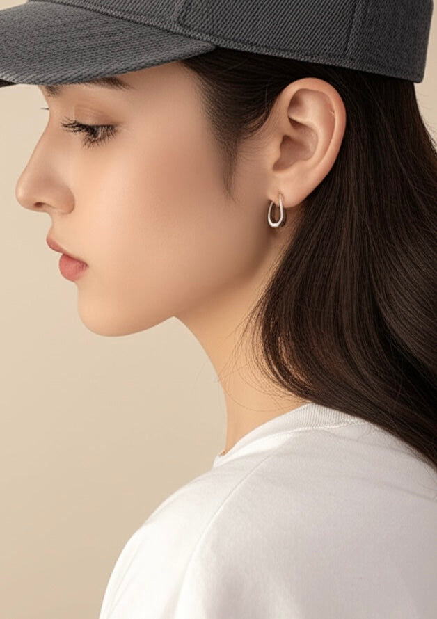 Teardrop silver hoop earrings