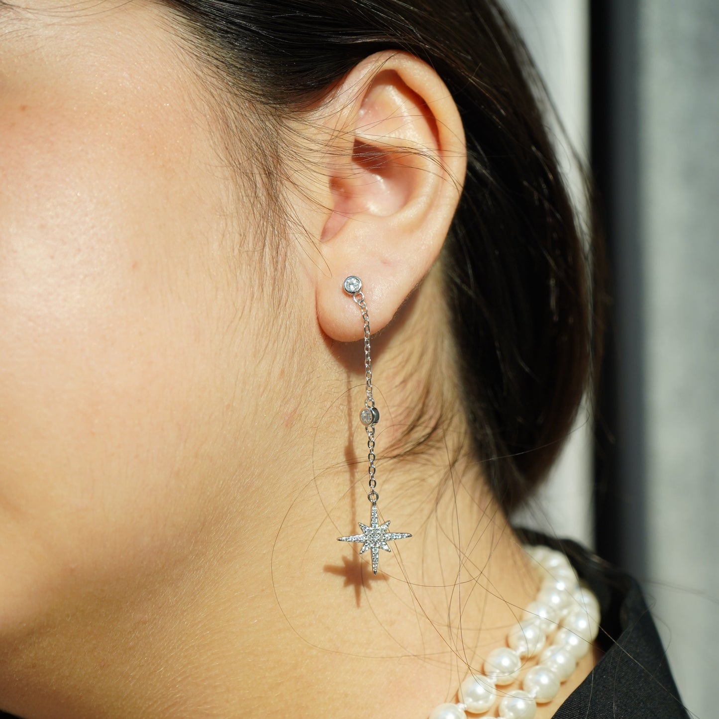 Sparkling dangling starburst earrings