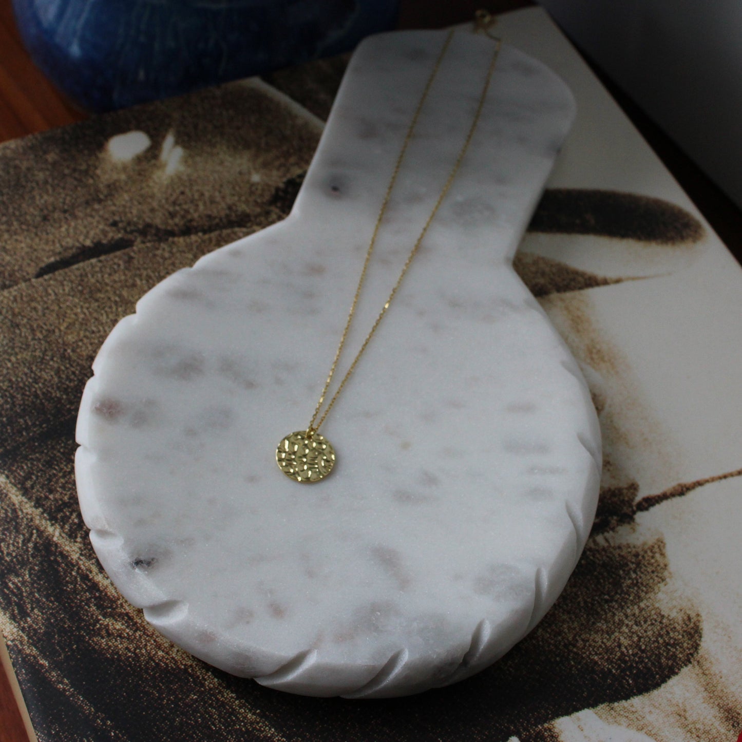 Hammered gold disc pendant necklace