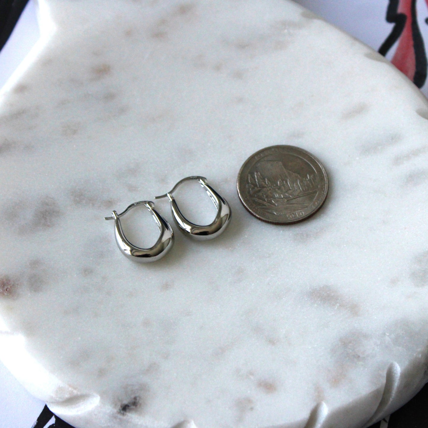 Teardrop silver hoop earrings