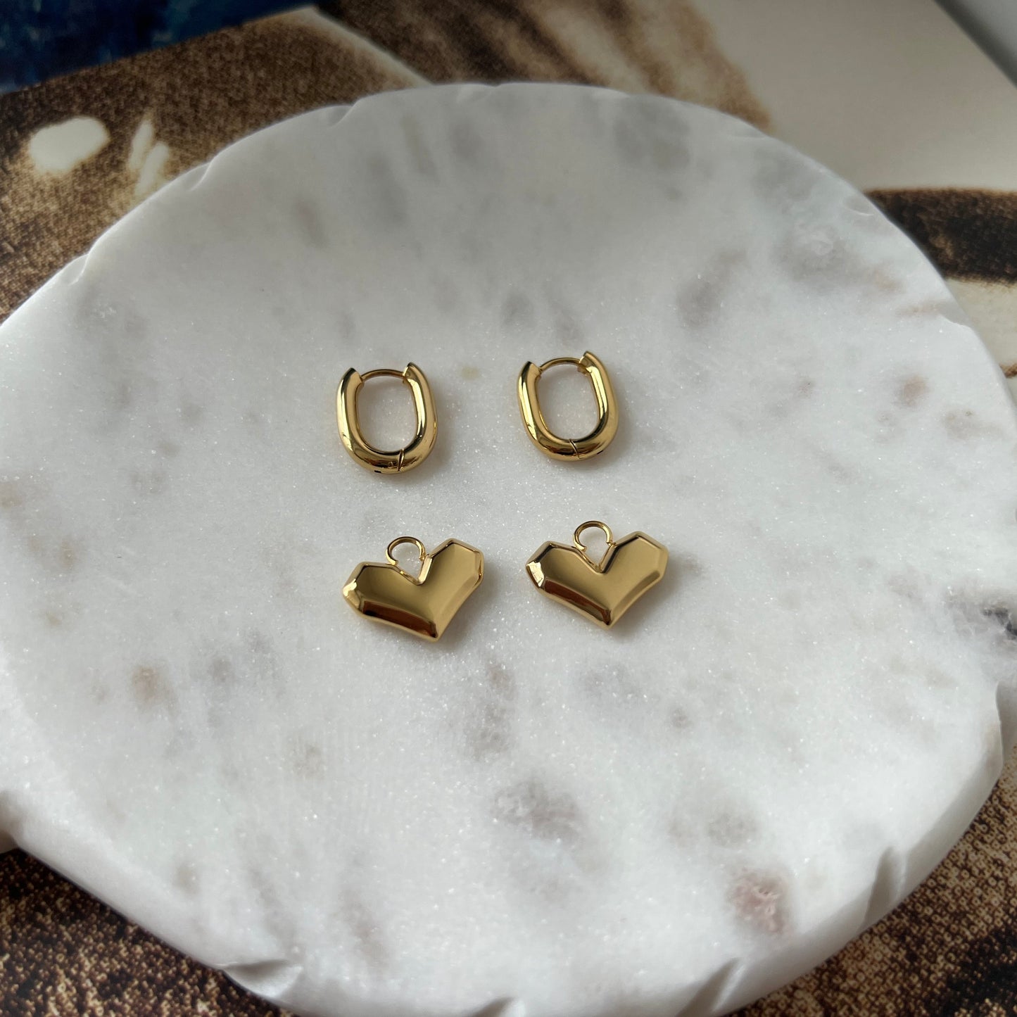 Golden hoops with removable heart charm earrings